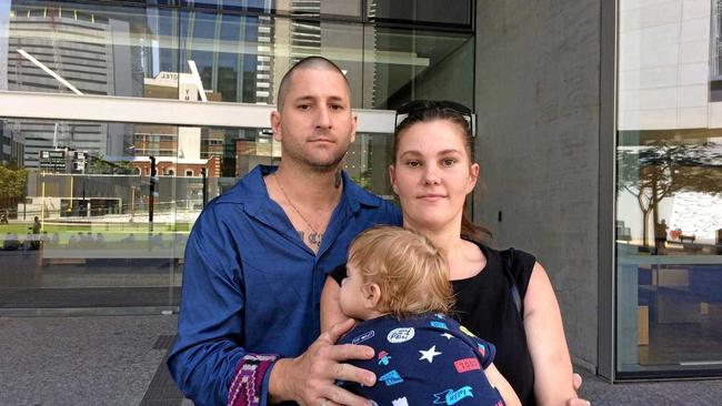 RECOVERED: Gympie father Timothy Udris, who survived a hammer attack in June, 2014, outside Brisbane Supreme Court with his wife Emily. Picture: Jessica Grewal