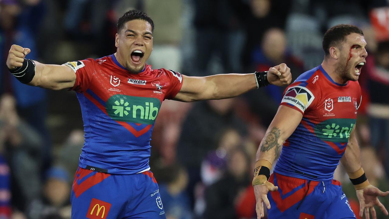 Jacob Saifiti and Adam Elliot of the Knights react to the win against the Melbourne Storm at McDonald Jones Stadium on July 22, 2023 in Newcastle, Australia. (Photo by Scott Gardiner/Getty Images)