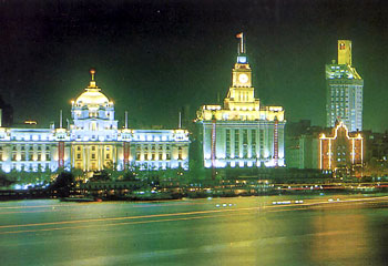 Light me up ... Shanghai's Parisian-style boulevard, the Bund is home to much of the city's most fashionable bars, restaurants and boutiques.