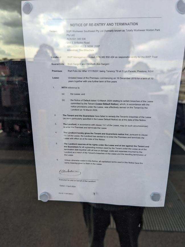 One of the eviction notices at one of the Totally Workwear franchise stores.