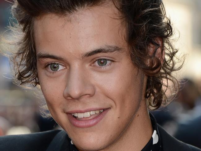 LONDON, ENGLAND - AUGUST 20: Singer Harry Styles from One Direction attends the "One Direction This Is Us" world premiere at the Empire Leicester Square on August 20, 2013 in London, England. (Photo by Ian Gavan/Getty Images for Sony Pictures)