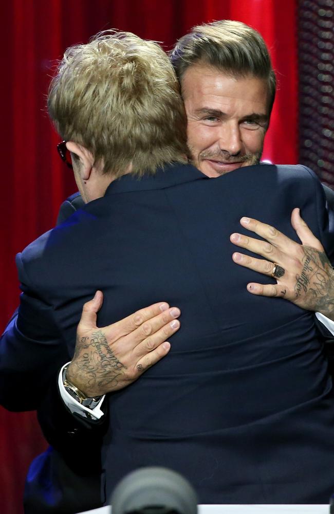 Recording artist Elton John (L) and UNICEF GWA Honoree David Beckham speaks onstage during the Sixth Biennial UNICEF Ball Honoring David Beckham and C. L. Max Nikias presented by Louis Vuitton at Regent Beverly Wilshire Hotel on January 12, 2016 in Beverly Hills, California. Picture: Jonathan Leibson/Getty Images for U.S. Fund for UNICEF