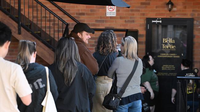 People who have travelled from across Brisbane queue outside Bella &amp; Tortie. Picture: John Gass