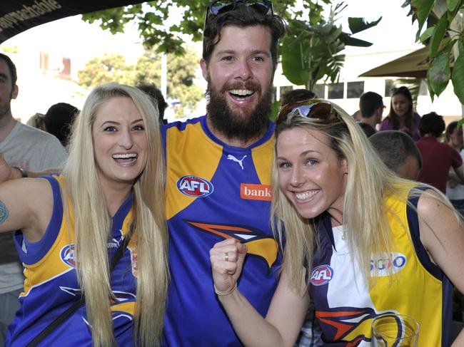 West Coast Eagles and Hawks fans are watching the game from many venues across Perth including here at the Wembley Hotel. pictured - West Coast Eagles supporters Anna Finkelstein, Peter Webster and Tracey Norris