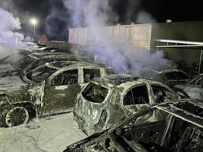 About 1am on Thursday emergency services were called to a car storage facility when multiple cars were set ablaze.