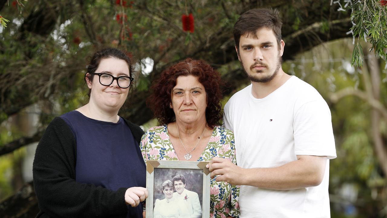 Michael Warburton’s wife Anita (centre) and his children Jessica and Riley. Mr Warburton was hit and killed by a stolen car allegedly driven by teens. Picture: Josh Woning