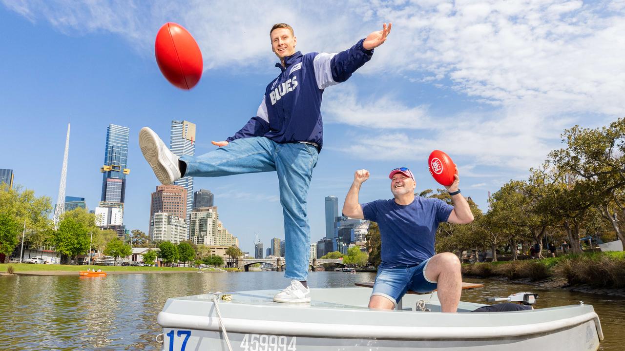 Daniel Gorringe and Jason Dunstall prepare for Fox Footy’s Longest Kick on Grand Final Day morning on the Yarra River. Picture: Jason Edwards