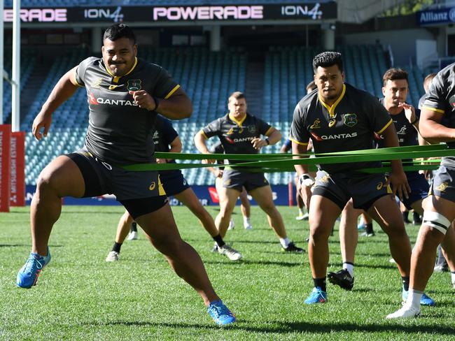 Australia 'Wallabies' players warm up during their Captains Run rugby training session at the Allianz Stadium in Sydney, Friday, June 22, 2018. The Australia 'Wallabies' play Ireland on Saturday night in the final match of the Ireland Series. (AAP Image/David Moir) NO ARCHIVING