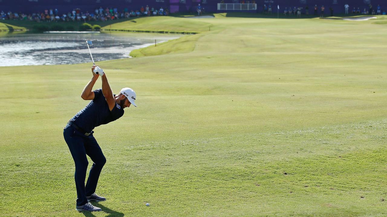 Dustin Johnson hits his second shot for eagle on the 18th hole during the final round of the FedEx St. Jude Classic at TPC Southwind.