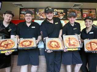 FEEDING THE MASSES: Domino's Pizza Gympie's Brad McCartin, Rob Elsley, Nick Snow, Jake Hulskamp and Jess Shayler prepare tonight's second game of State of Origin. Picture: Rowan Schindler