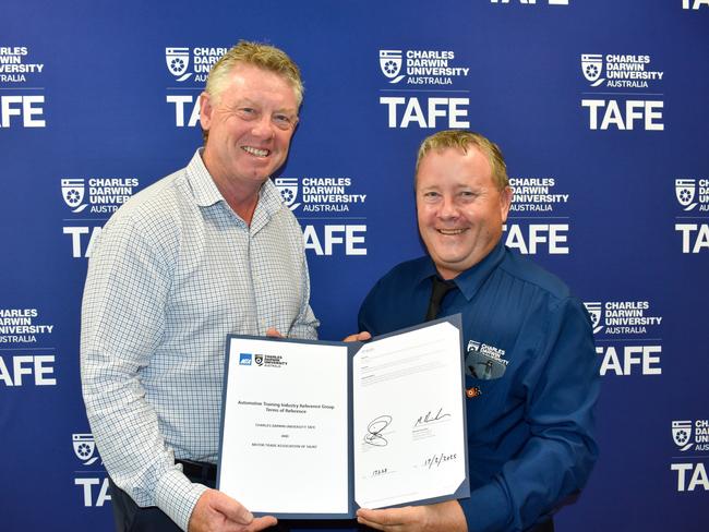 Motor Trade Association SA/NT CEO Darrell Jacobs and CDU TAFE Pro Vice Chancellor and Chief Executive Officer of CDU TAFE Michael Hamilton. Picture: Motor Trade Association / Supplied.