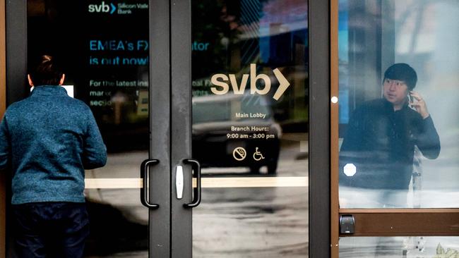 A customer reads a notice about Silicon Valley Bank’s closure at its California headquarters. Picture: AFP