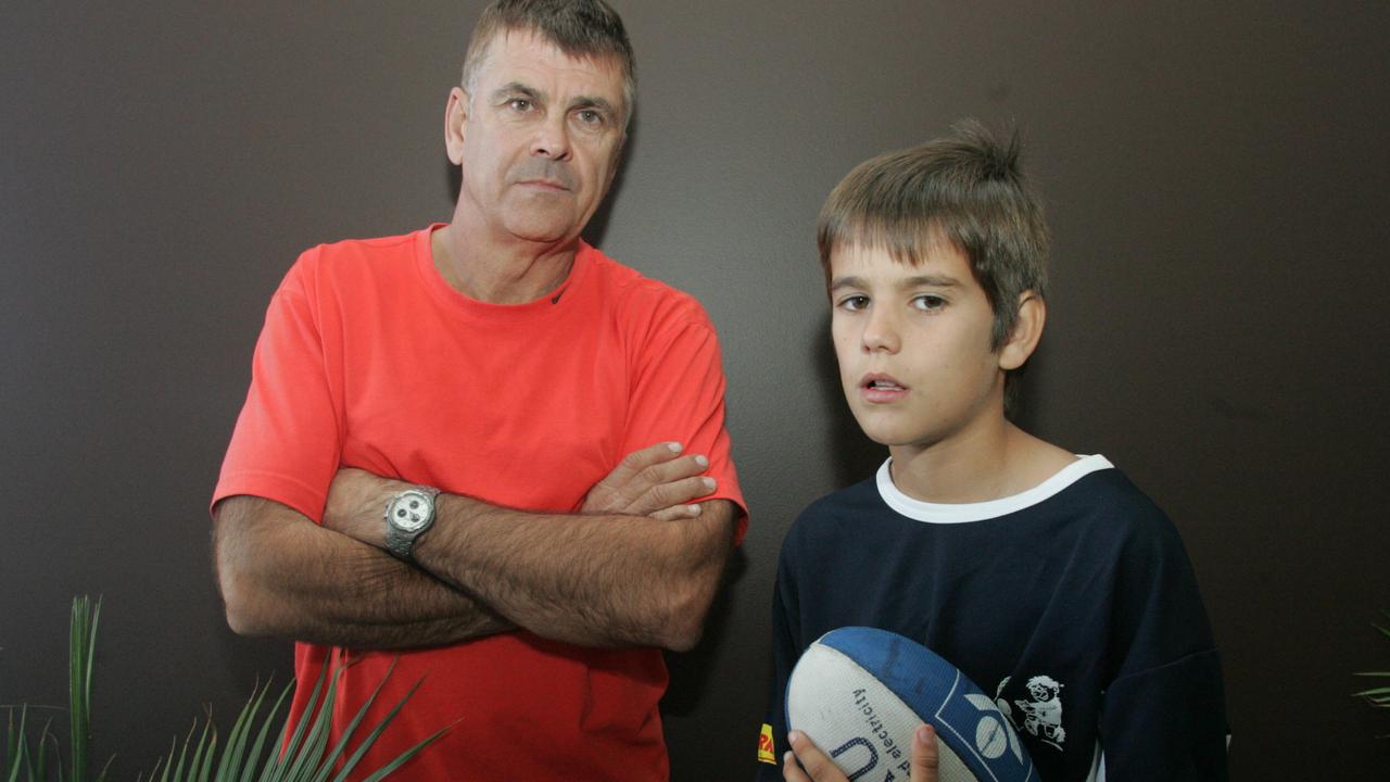 AFL Coolangatta Tweed under-12s player Hunter Battye, 11, was threatened by a father from an opposing team at a weekend game. Battye pictured with his father Howard. Picture: Sarah Marshall.