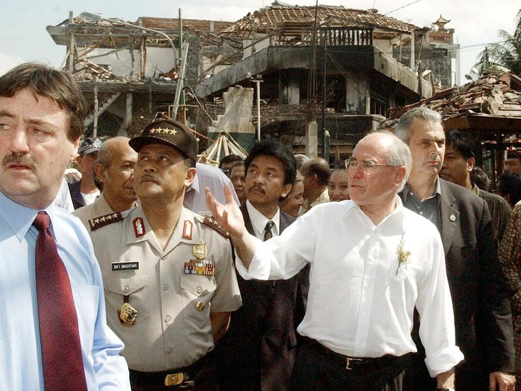 Former Australian PM John Howard toured the site of the Bali bombing of October 12, 2002, and responded to growing terrorism fears at home by introducing tough border protection policies. Picture: Dean Lewins