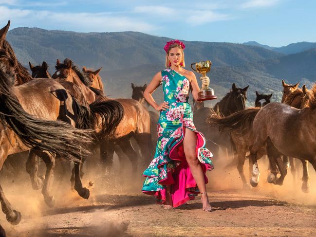 WARNING HOLD FOR MONDAY TALK TO CAMERON TANDY. Melbourne Cup Carnival Ambassador Olivia Molly Rogers with the 2018 Lexus Melbourne Cup at Bogong Horseback Adventures station in Tawonga, country Victoria. Picture: Jason Edwards