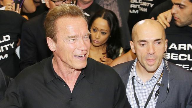 Harry Korras flanks Arnold Schwarzenegger during the movie star’s visit to Melbourne.