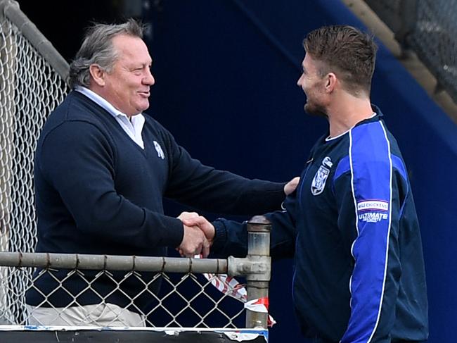 Bulldogs great Terry Lamb greets Kieran Foran during a Canterbury-Bankstown Bulldogs  NRL training session at Belmore in Sydney, Thursday, June 4, 2020. (AAP Image/Joel Carrett) NO ARCHIVING