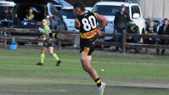 Rushworth captain Liam Francis kicks the ball forward. Picture: Angela McKinley.
