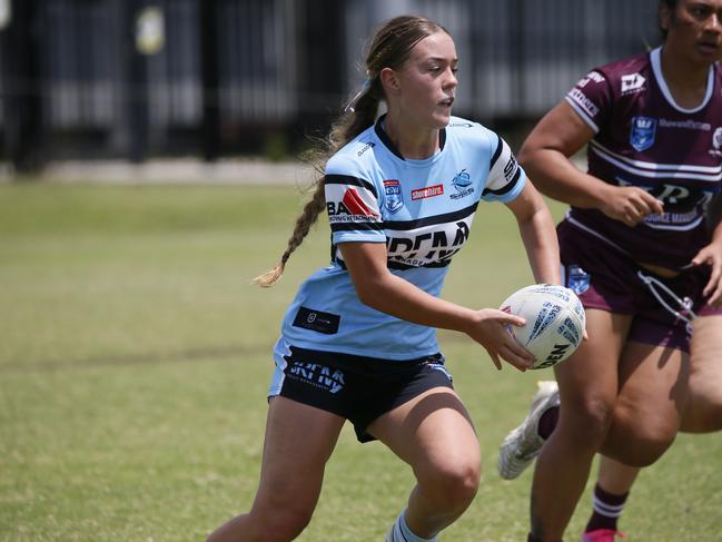 Mikayla Langer scored a try for Cronulla in Tarsha Gale. Picture Warren Gannon Photography