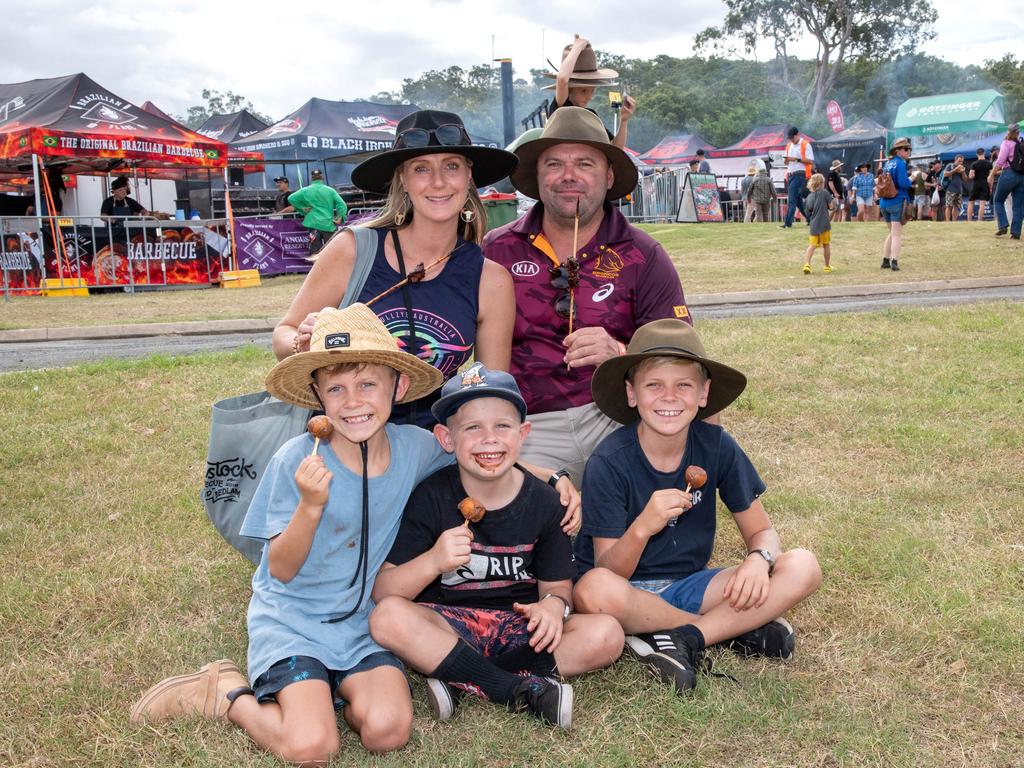 Tasty treats for the Searle family from Bundaberg, Jody and Chris Searle with their sons, from left; Oliver, Harry and Cooper. Meatstock - Music, Barbecue and Camping Festival at Toowoomba Showgrounds.Friday March 8, 2024 Picture: Bev Lacey