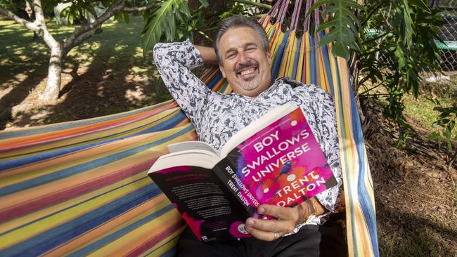 Terry Hansen relaxes in the back yard of his home in Tarragindi Picture: Glenn Hunt