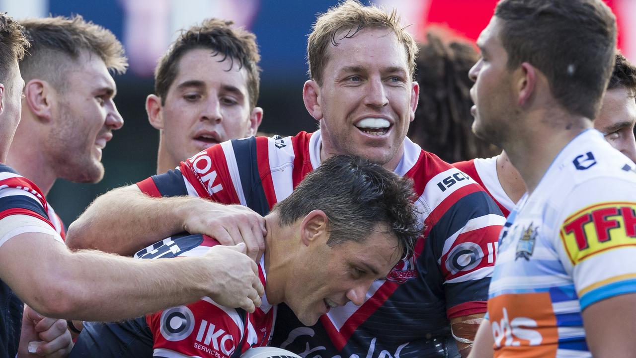 Cooper Cronk of the Roosters celebrates with teammates.