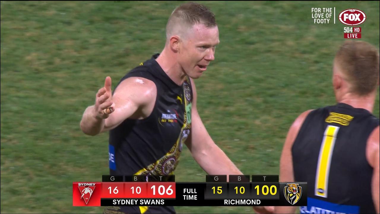 Jack Riewoldt argues with the field umpire, but to no avail.