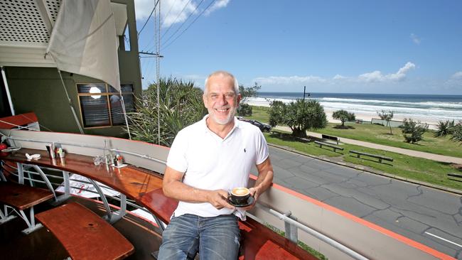 Greg Colwill at his Elephant Rock Cafe on the Currumbin beach front. Pic by Luke Marsden.