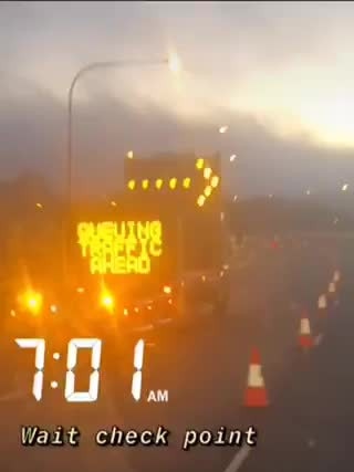 The man drives past the Murray River before driving past a sign warning of traffic, only to glide through the checkpoint without being stopped.