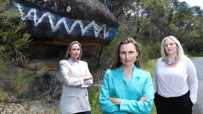 From left, teal candidates for Sydney’s Northern Beaches seats Jacqui Scruby and Joeline Hackman, with Northern Beaches Bushland Guardian spokesperson Sarah Baker, at Lizard Rock in Belrose. Picture: John Feder