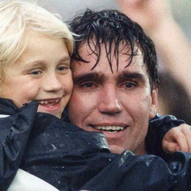 Erin Phillips with her dad Greg. Credit: Port Adelaide FC.