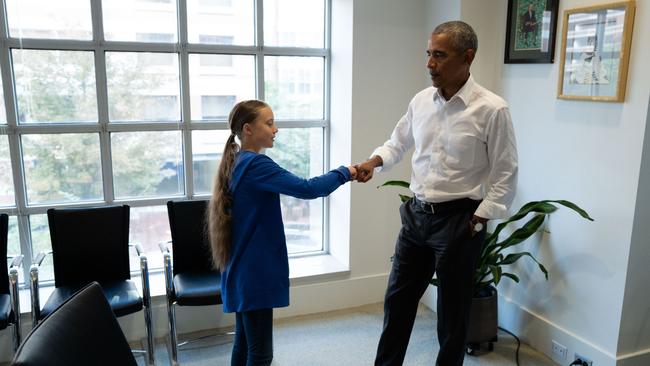 Former US President Barack Obama, right, meets with Greta Thunberg at the Obama Foundation headquarters in Washington DC. Picture: AFP