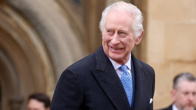 King Charles III smiles as he leaves after attending the Easter Matins Service at St. George's Chapel, Windsor Castle. Picture: Hollie Adams – WPA Pool/Getty Images.