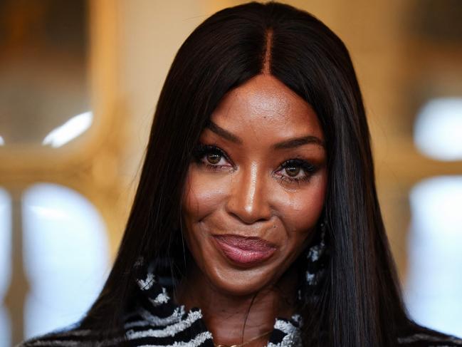 TOPSHOT - British model Naomi Campbell cries after being awarded the 'Chevalier de l'ordre des Arts et des Lettres' (Knight of the Order of Arts and Letters) title at the French Ministry for Culture in Paris on September 26, 2024. (Photo by Anne-Christine POUJOULAT / AFP)