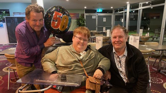 Fiona Searle with brothers Reg Searle and Gus Searle on her 50th birthday. Fiona Searle who died after a fall on May 1st 2021. Picture: supplied by the family