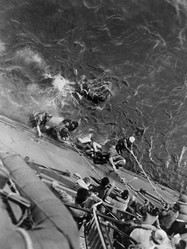 Survivors of the sinking of the US aircraft carrier Lexington climb aboard another ship following the battle of the Coral Sea. Picture: Time Life Pictures/Getty