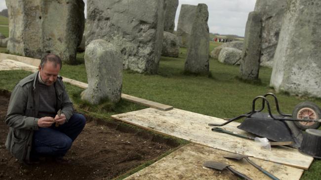 Some of England's most sacred soil was disturbed for the first time in more than four decades as archeologists, including Professor Tim Darvill, tried to solve the enduring riddle of Stonehenge: when and why was the prehistoric monument built. Picture: AP Photo/Kirsty Wigglesworth