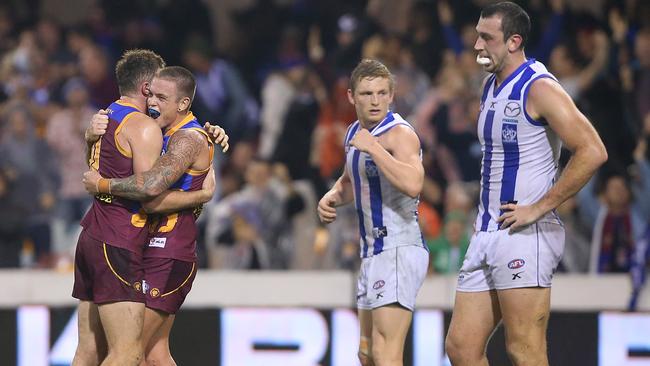 Pearce Hanley and Claye Beams celebrate after the final siren.