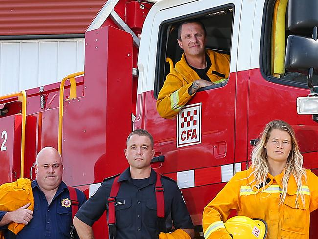 District 7 CFA firefighters who have returned from duty fighting the NSW fires.Phil Campbell Torquay Captain ( in truck) , Brooke Killen Deputy Group Officer Anakie Group , Mick Rowell Commander District 7 CFA and Sam Suendermann Anglesea CFA. Picture : Ian Currie