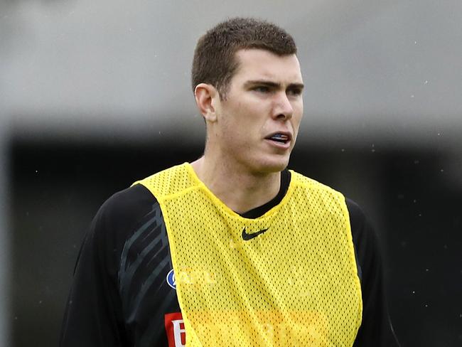 MELBOURNE, AUSTRALIA - JUNE 10: Mason Cox of the Magpies and Ash Johnson of the Magpies look on during the Collingwood training session at the Holden Centre on June 10, 2021 in Melbourne, Australia. (Photo by Dylan Burns/AFL Photos via Getty Images)