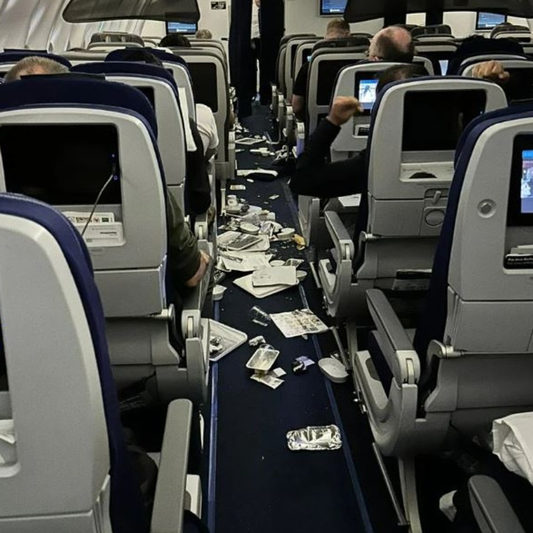 Belongings strewn across the aisle after turbulence hit the flight. Picture: Twitter