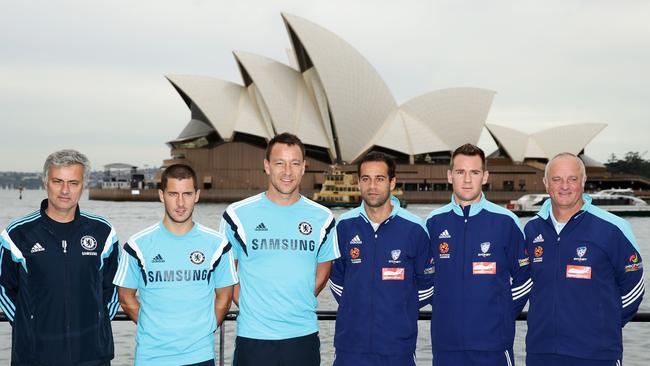 Jose Mourinho, Eden Hazard and captain John Terry of Chelsea FC next to captain Alex Brosque and Shane Smeltz and Graham Arnold.