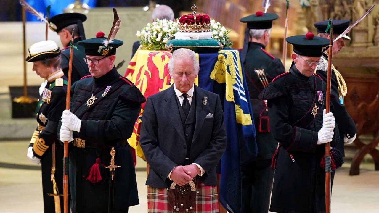 Queen's children take part in vigil