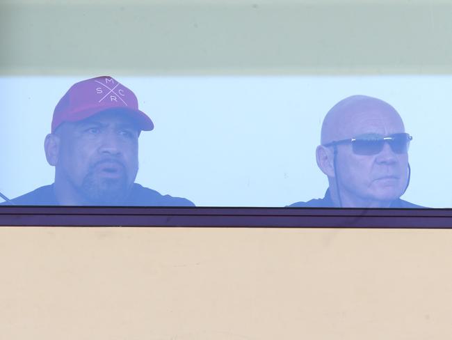 John Hopoate and Bob Fulton sitting in the coaches box at Brookvale Oval.