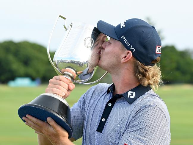 BRISBANE, AUSTRALIA - JANUARY 16: Jediah Morgan of Australia kisses the Kirkwood Cup as he celebrates victory during day four of the 2021 Australian PGA Championship at Royal Queensland Golf Club on January 16, 2022 in Brisbane, Australia. (Photo by Bradley Kanaris/Getty Images)