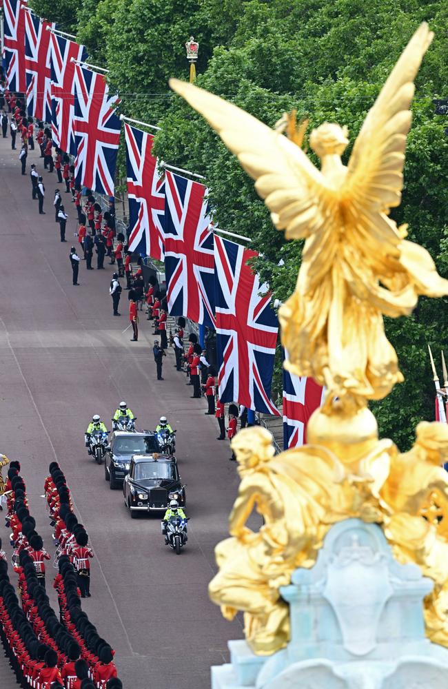 Prince Charles, Prince of Wales, and Camilla, Duchess of Cornwall, are driven along the Mall towards Buckingham Palace. Picture: Getty