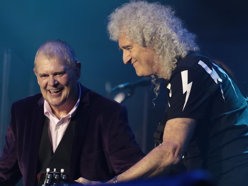 John Farnham and Brian May of Queen rock the stage. Picture: Getty Images