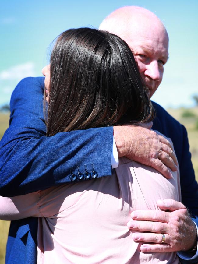 Ex detective and cold case specialist Damian Loone and Rachelle Childs sister Kristy hug after talking about Rachelle's case. Picture: Jeff Darmanin