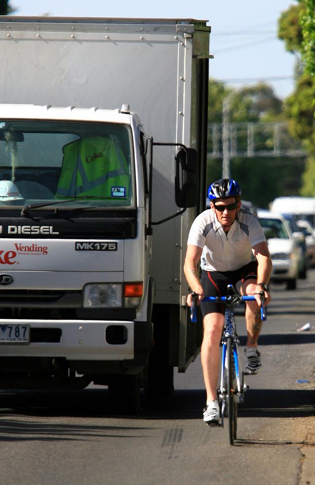 Cycling and road safety activists say existing laws requiring motorists to leave a safe distance when passing someone on a bike aren’t being enforced or taken seriously.