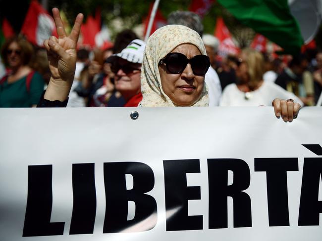 Demonstrators hold a banner reading “Freedom” during a protest in Rome to mark 70 years since the Palestinian “Nakba” of 1948. Picture: AFP